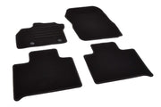 Renault Zoe 2013-2019 custom textile floor mats, black, durable, with non-slip backing and reinforced pedal area.
