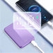 Purple Magsafe Powerbank Deluxe charging a smartphone with seamless connection.