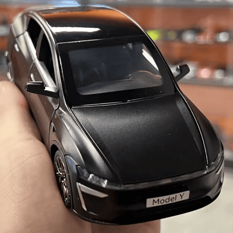 Tesla Model Y Juniper 2025 Modellauto 1/32 in schwarz, detaillierte Nachbildung, ideal für Sammler und Geschenke.