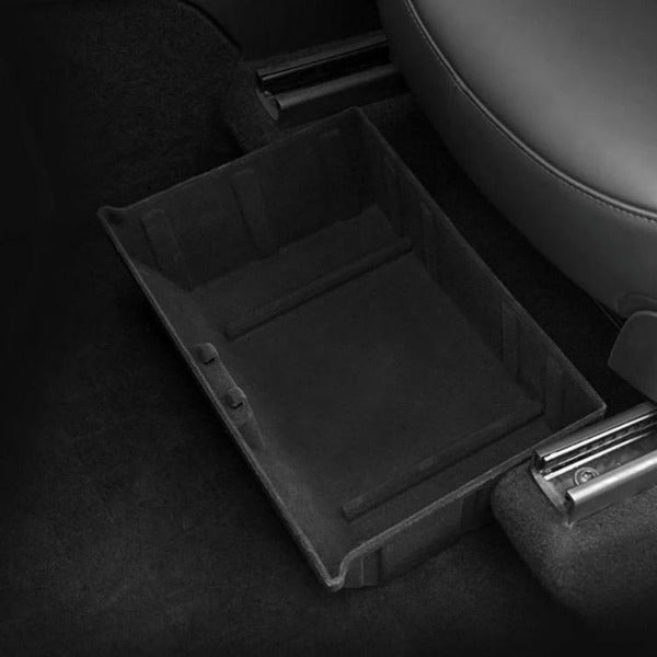 Ablageschublade unter Sitz Tesla Model Y —